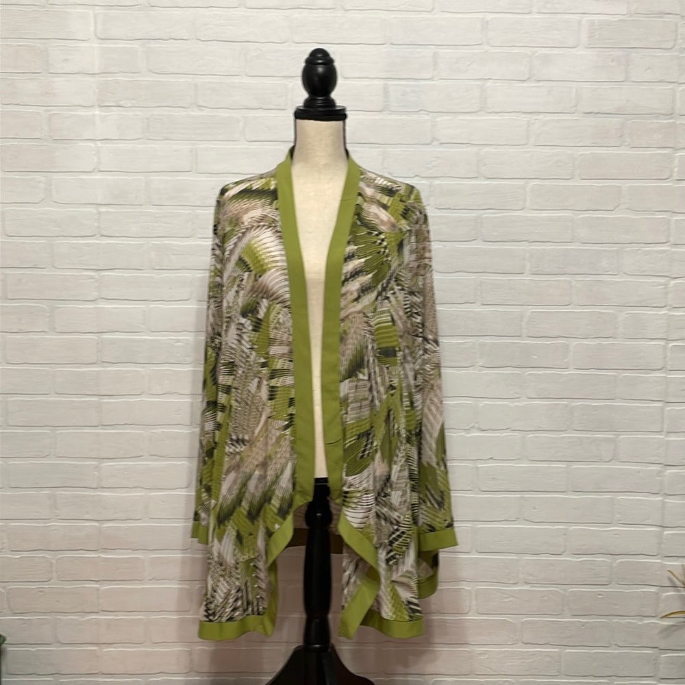 Lightweight classy swimsuit coverup. Great condition.